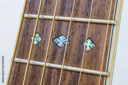 Acoustic Guitar detail - fret inlay close - from below
