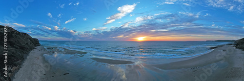 Panorama from Praia Vale Figueiras in Portugal at sunset