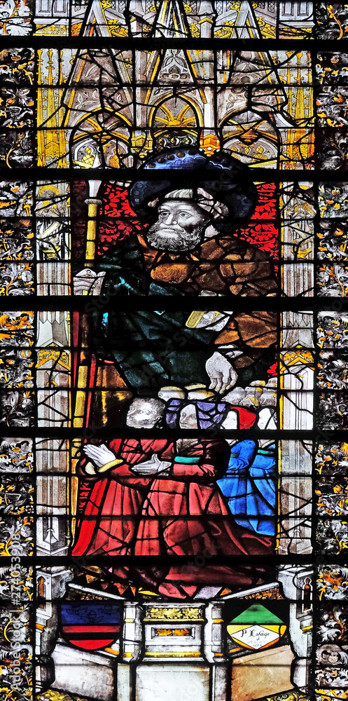 Saint Martin, stained glass window in Saint Severin church in Paris, France