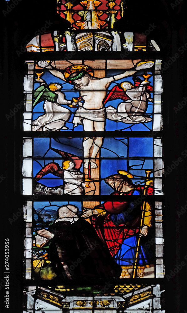 Crucifixion, stained glass window in Saint Severin church in Paris, France 