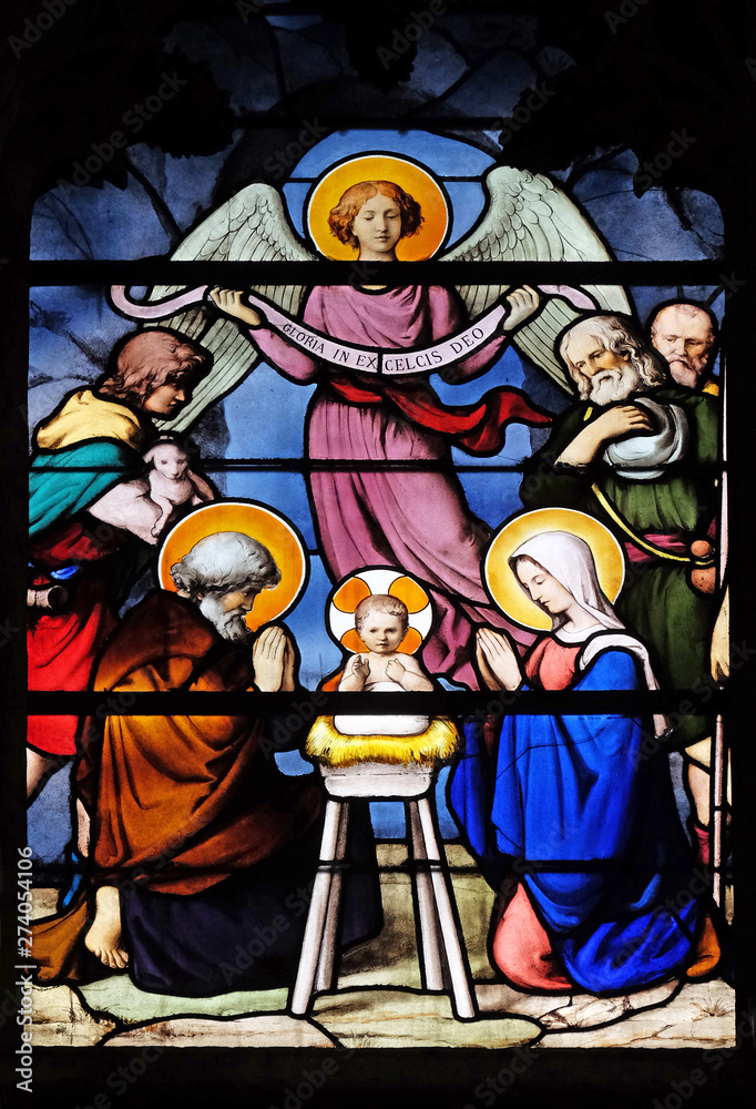 Nativity Scene, Adoration of the Shepherds, stained glass window in Saint Severin church in Paris, France