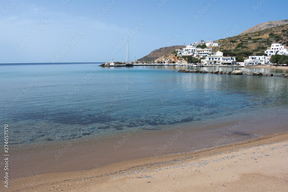 Greece, the quiet island of Sikinos in the Cyclades chain. The harbor beach.  A spring day before the summer crowds.  The weather is perfect and the beach is your own.