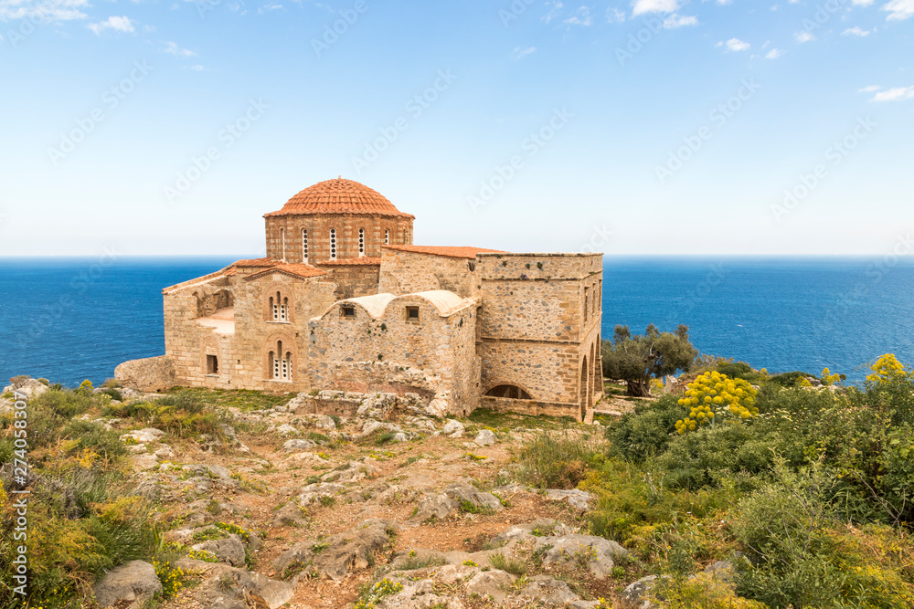 Monemvasia, Greece. The Church of Agia Sophia on top of the plateau, with the sea in the background