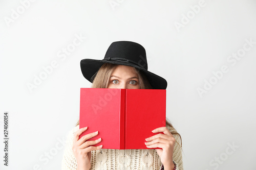 Shocked young woman with bo...