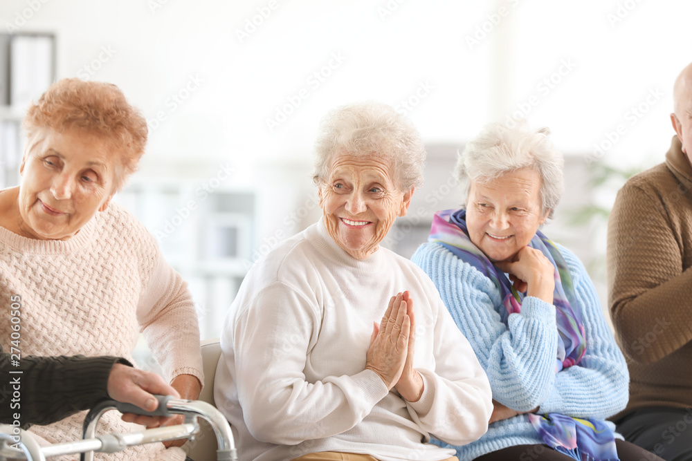 Group of happy senior people in nursing home Group of happy senior people in nursing home