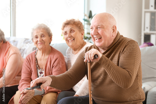 Group of senior people spending time together in nursing home