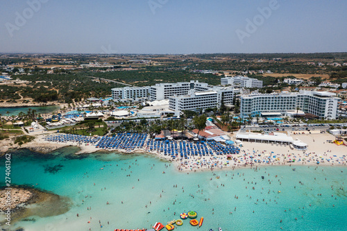 Beautiful aerial view of the most famous beaches in Cyprus - Nissi Beach, Landa beach, Pantachou Beach photo