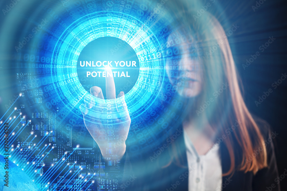 The concept of business, technology, the Internet and the network. A young entrepreneur working on a virtual screen of the future and sees the inscription: Unlock your potential The concept of business, technology, the Internet and the network. A young entrepreneur working on a virtual screen of the future and sees the inscription: Unlock your potential