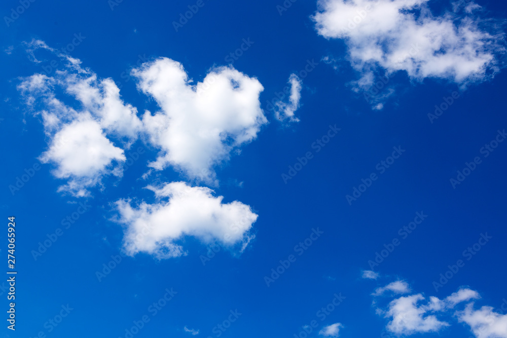 Clouds and blue sky background with copy space.