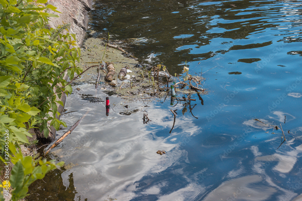 Environmental problems litter in the river plastic bottles Environmental problems litter in the river plastic bottles