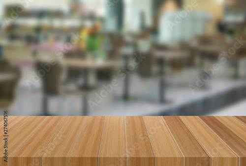 Wooden tables with blurred backgrounds can be used to display or edit to advertise your product.