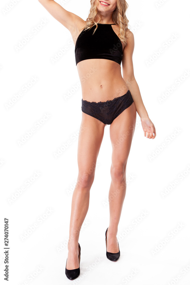 sexy girl on a white background. Black Underwear. fashion girl. Blonde girl. 