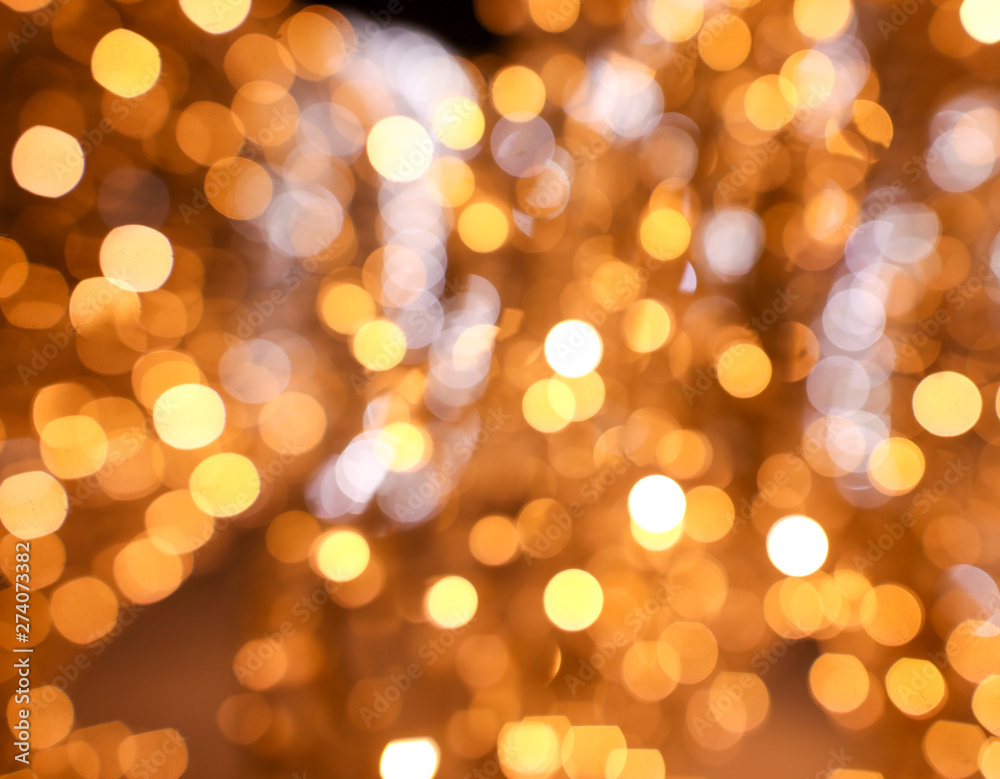 Golden bokeh lights as abstract background