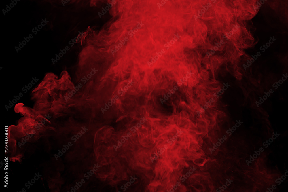 Abstract red smoke on black background. Red color clouds.