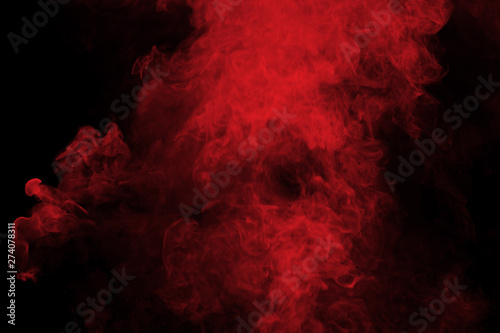 Abstract red smoke on black background. Red color clouds.