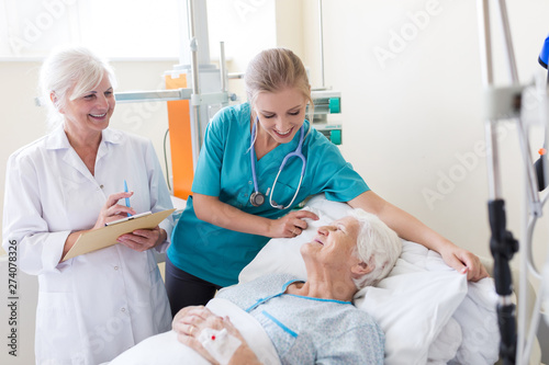 Senior patient in hospital bed