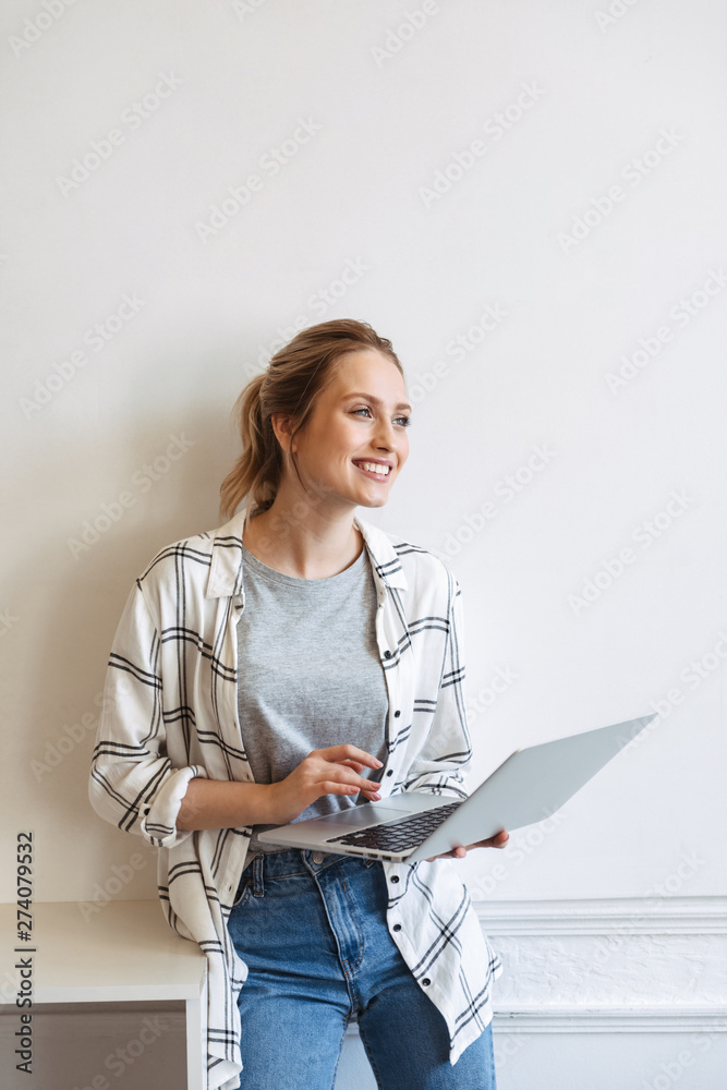 Lovely young girl student studying with laptop Lovely young girl student studying with laptop