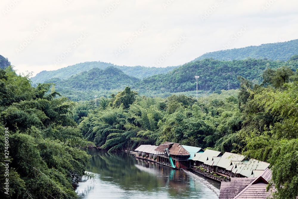 Many wooden house floating on the river