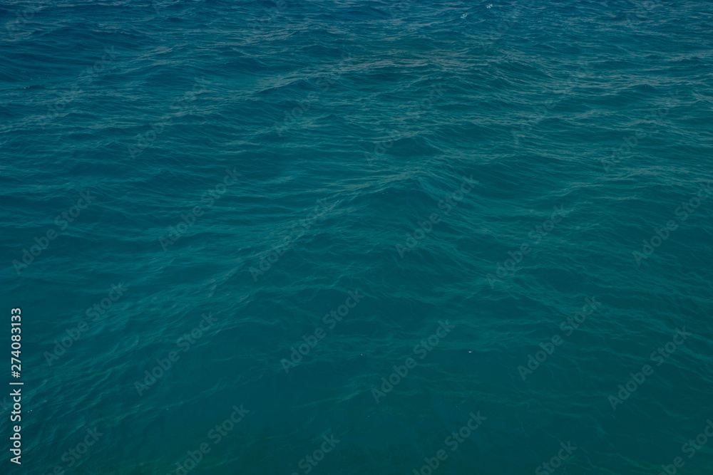 wavy blue water surface perspective background 