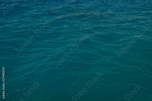 wavy blue water surface perspective background © Артём Князь