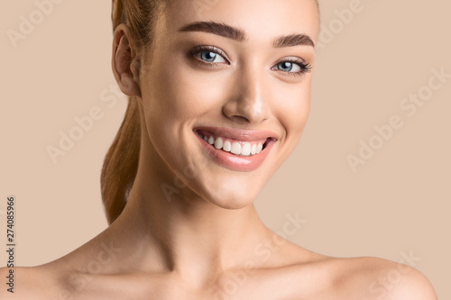 Natural Beauty. Beautiful Girl With Clean Skin And White Teeth