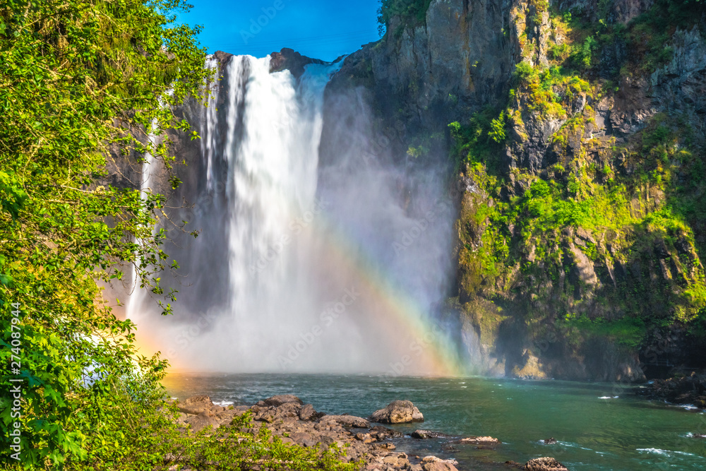 Clear Skies and Double Rainbow Over Snoqualmie Falls in Washington