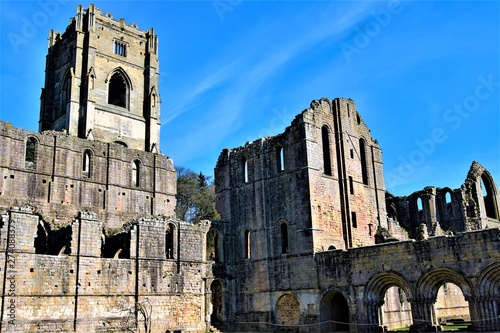 Blue sky thinking at Fountain's Abbey, North Yorkshire, England photo