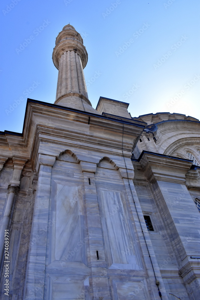 Looking up at minaret at Nuruosmaniye Mosque in Istanbul, Turkey