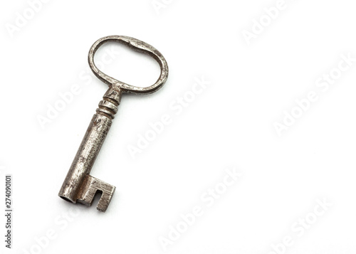 Old key on plain white background