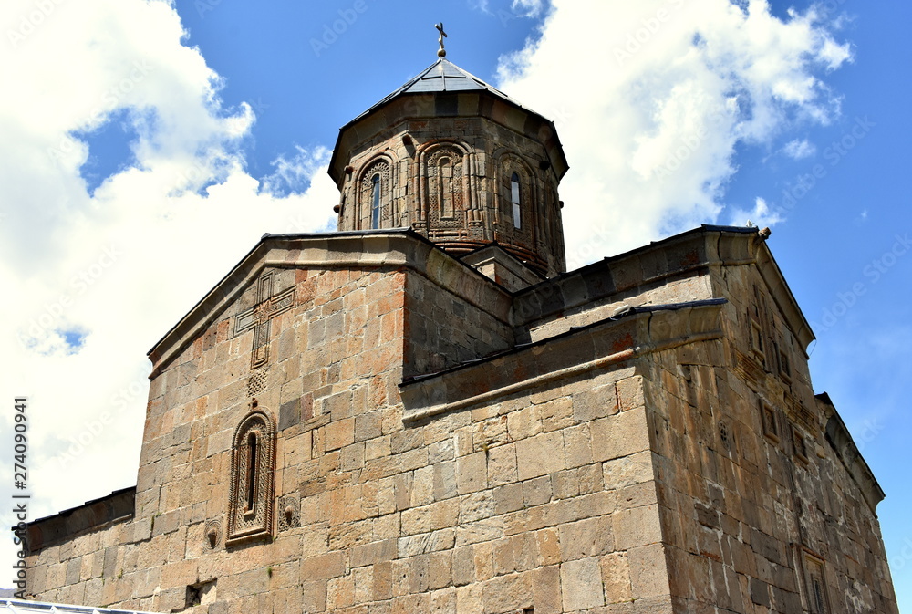 View of Gergeti Trinity Church in the Caucasus mountains, Georgia