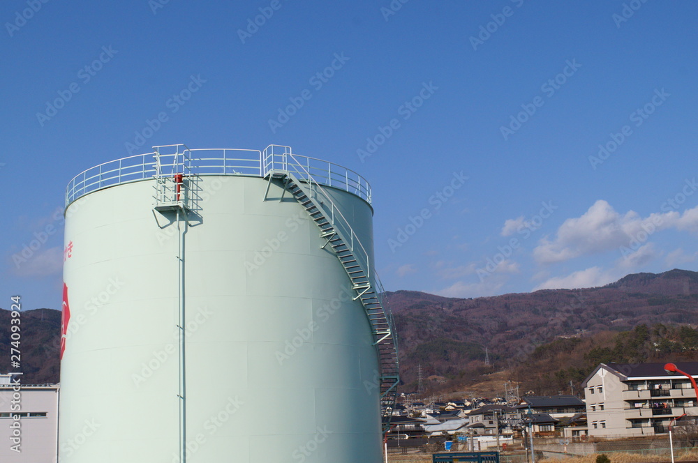 Fototapeta premium Chemical plant gas petroleum tank