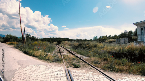 Obraz na plátně Pov of Car Driver Cross The Tracks At Railway Level Crossing