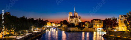 Panorama of The Cathedral of Notre Dame de Paris, France at sunset