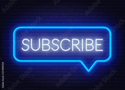 Neon sign subscribe in speech bubble frame on dark background. Light banner on the wall background.