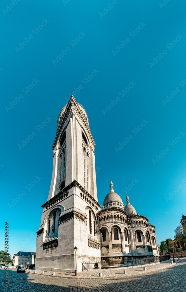 Bell tower of Sacre Ceure cathedral in Paris, vertical