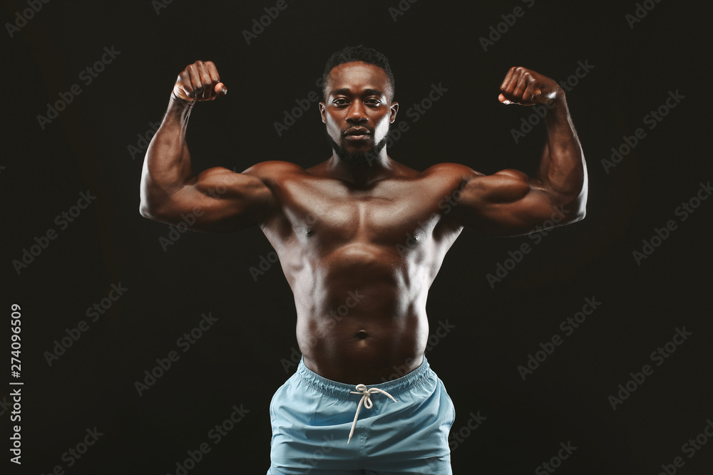 African athlete showing muscular hands and shoulders