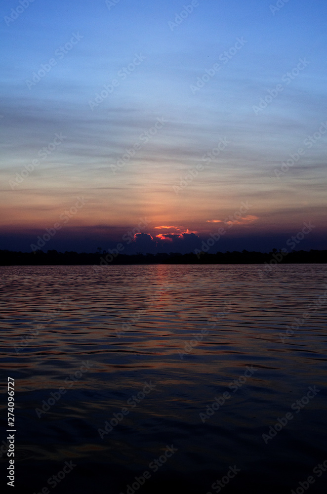Naklejka premium sunset clouds sun sky horizon silhouette 