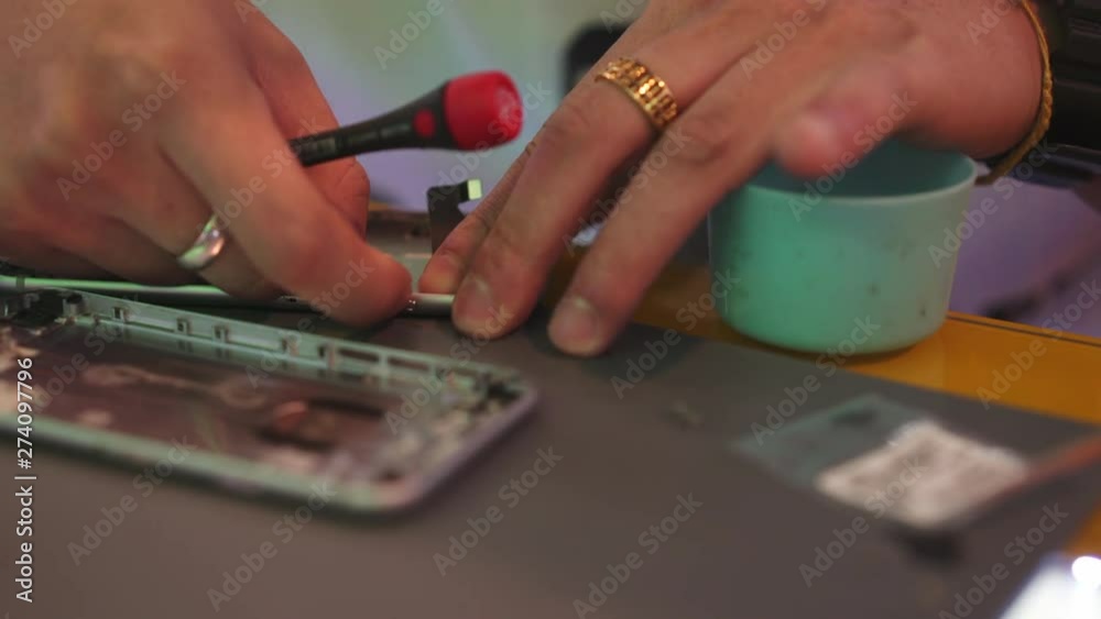 Skilled mobile phone repair technician (4K) Skilled mobile phone repair technician (4K)