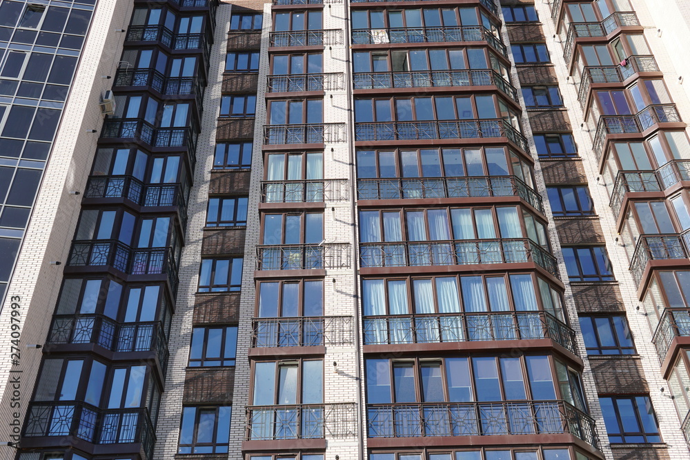Fototapeta premium Modern condominium building real etate in city with blue sky