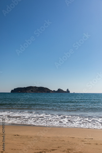 Island view from the beach on sunny day - Medes Islands