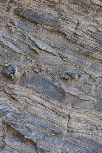 Textura de pedra natural. Superfície texturizada de rocha natural, onde se podem ver as linhas desenhadas na rocha ao longo do tempo. Pode ser usada como fundo.