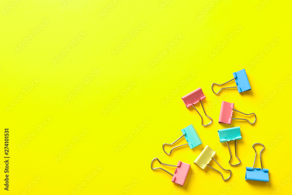 Flat lay composition with clips on color background, space for text Flat lay composition with clips on color background, space for text