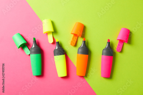 Open highlighters on two tone background, space for text