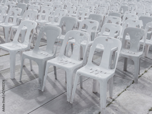 White plastic chairs in outdoor event