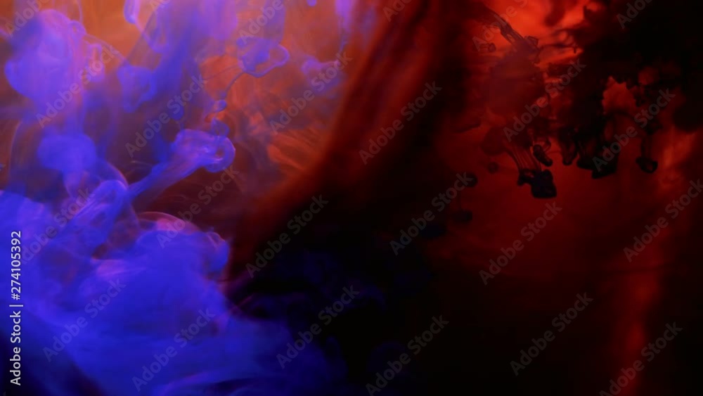 Abstract colorful dye mixing in water. Blue and orange inks interfusion. Motion and animation effect Abstract colorful dye mixing in water. Blue and orange inks interfusion. Motion and animation effect