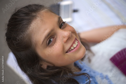 portrait of a beautiful little cheerful girl