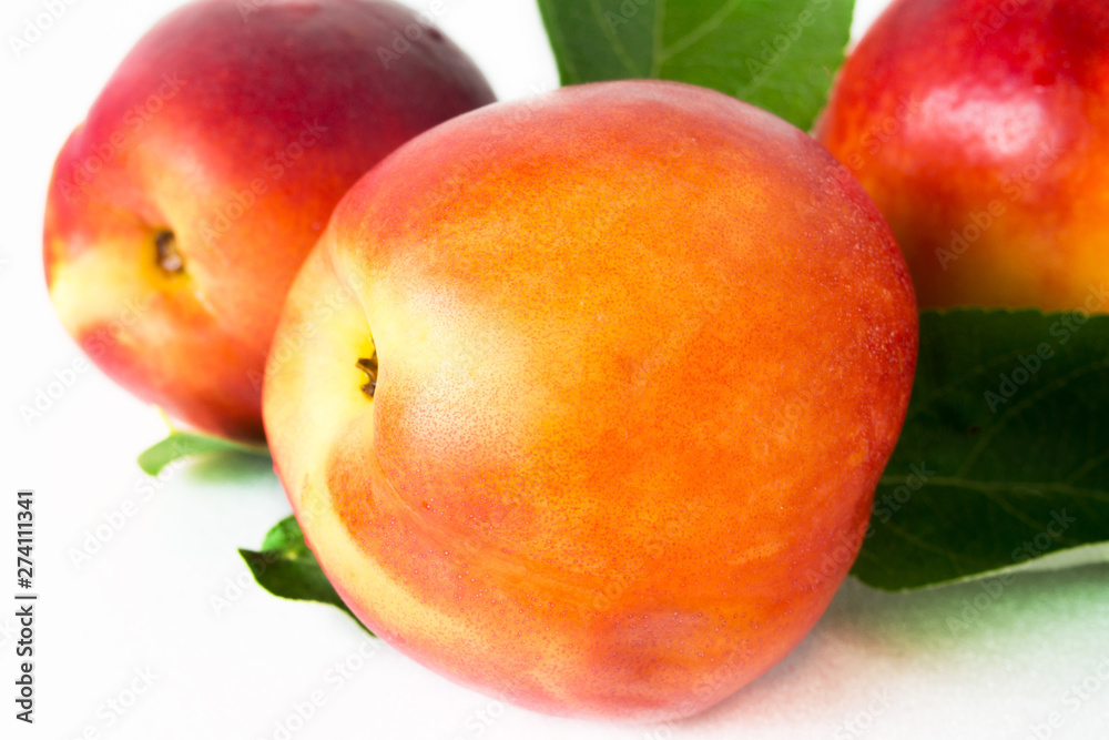 one fresh tasty peach on a white background one fresh tasty peach on a white background