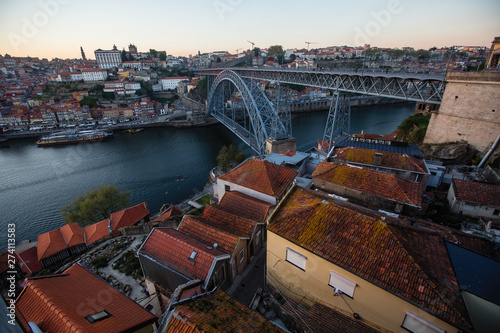 View of the Luis I Iron bridge over the Douro river at dusk, Porto, Portugal.