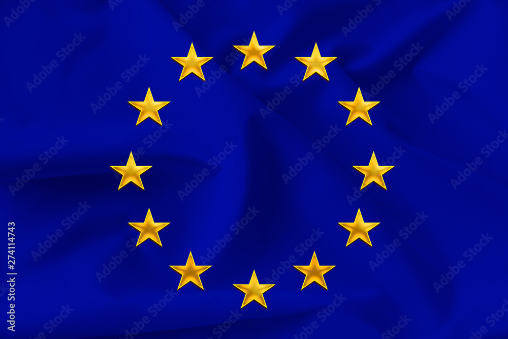 beautiful national flag of the European Union on soft silk with soft folds close-up on the background, the concept of unity, cooperation, international union beautiful national flag of the European Union on soft silk with soft folds close-up on the background, the concept of unity, cooperation, international union