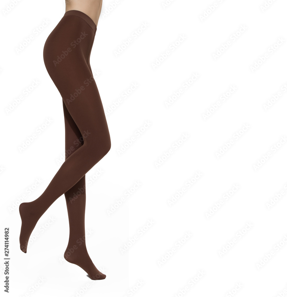 Legs of sexy young caucasian woman in nylon tights on white background Legs of sexy young caucasian woman in nylon tights on white background